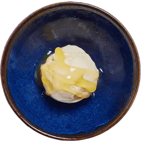 vanilla pod ice cream with passion fruit sauce